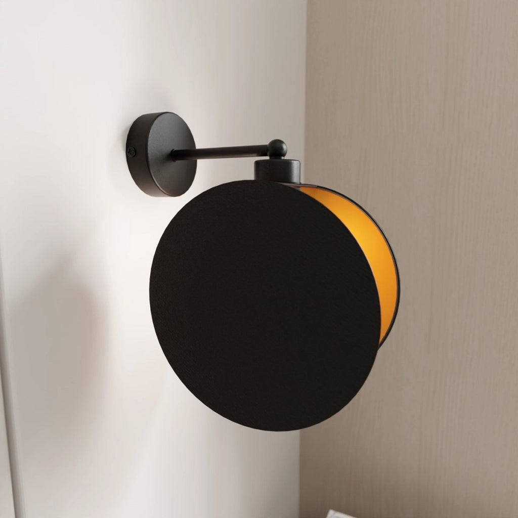 Lampada da parete MOTIF in acciaio nero e oro