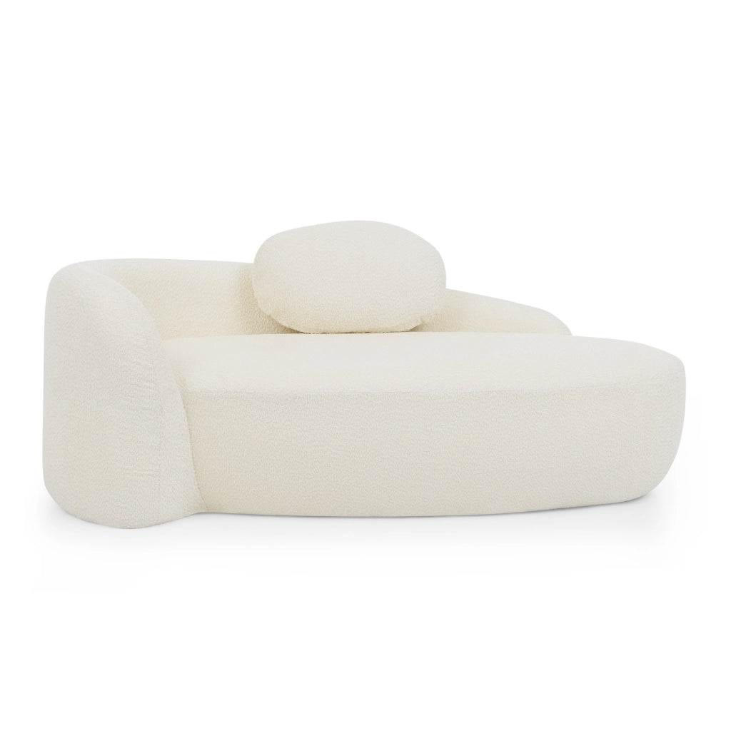 Divano compatto in tessuto Teddy beige con design arrotondato e cuscino integrato