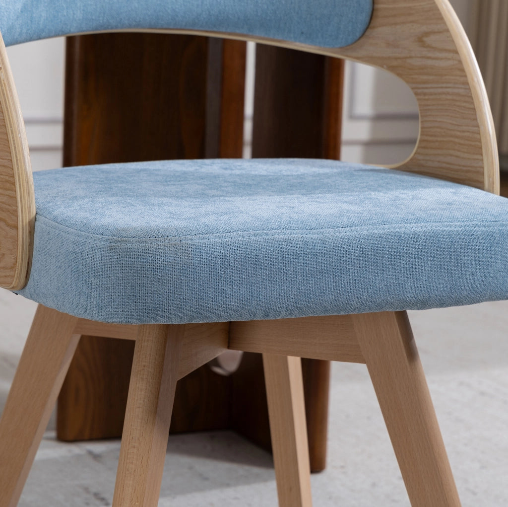 Sedia da pranzo girevole in lino blu con gambe in faggio
