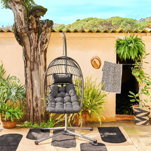 Poltrona sospesa in acciaio, rattan, poliestere, antracite