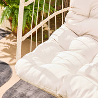 Poltrona sospesa in acciaio, rattan, poliestere, beige