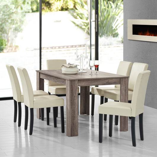 Set Pranzo con Tavolo 140x90 cm e 6 Sedie in Similpelle - Effetto Rovere Antico / color Crema  [en.casa]