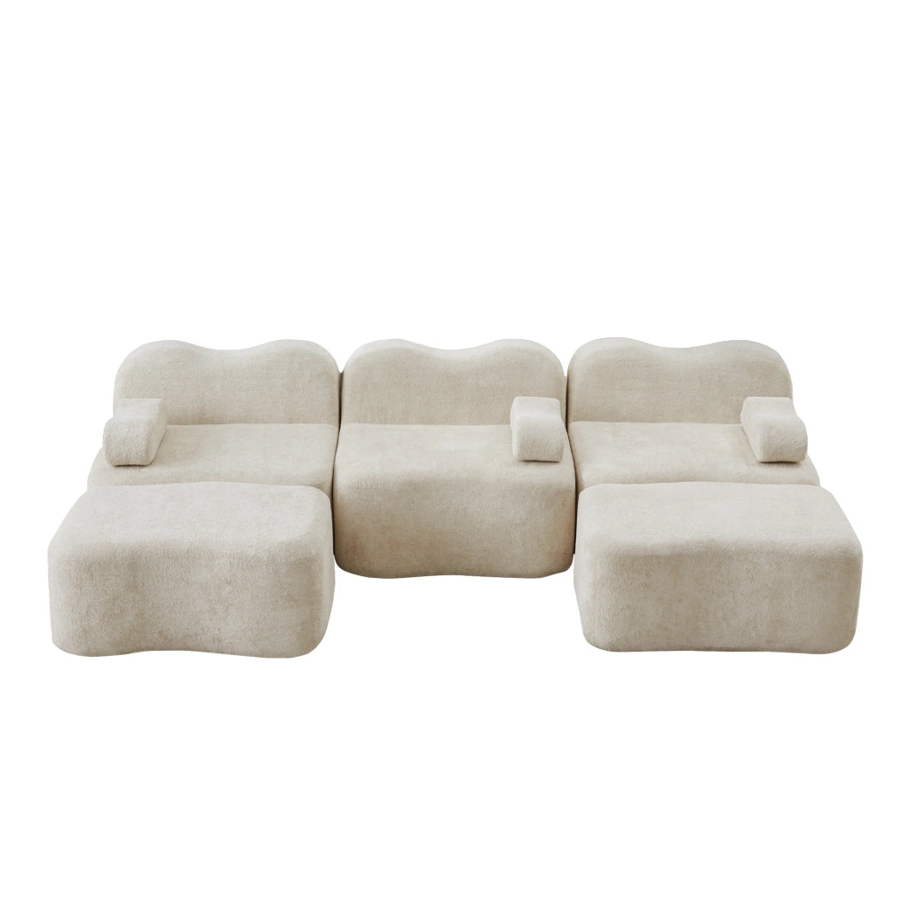 Divano angolare modulare componibile senza telaio con seduta profonda e pouf, in velluto beige per soggiorno familiare