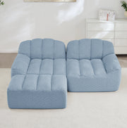 Divano modulare angolare 2 posti con pouf; senza struttura; in fleece granulato blu