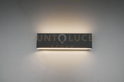 CONCHA APPLIQUE LED 6W · 2x 600lm, 3000K BI-EMISSIONE METALLO COLORE ANTRECITE CON REGOLAZIONE D'INTENSITA' 3 STEP AD INTERRUTTORE L. 28CM P. 4,5CM