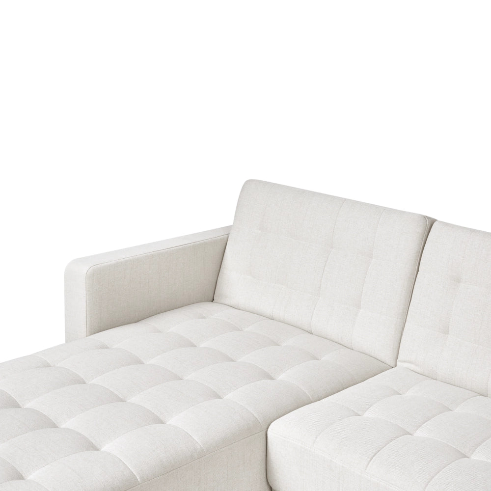 Divano letto angolare in tessuto bianco sporco versione destra con pouf moderno a L componibile