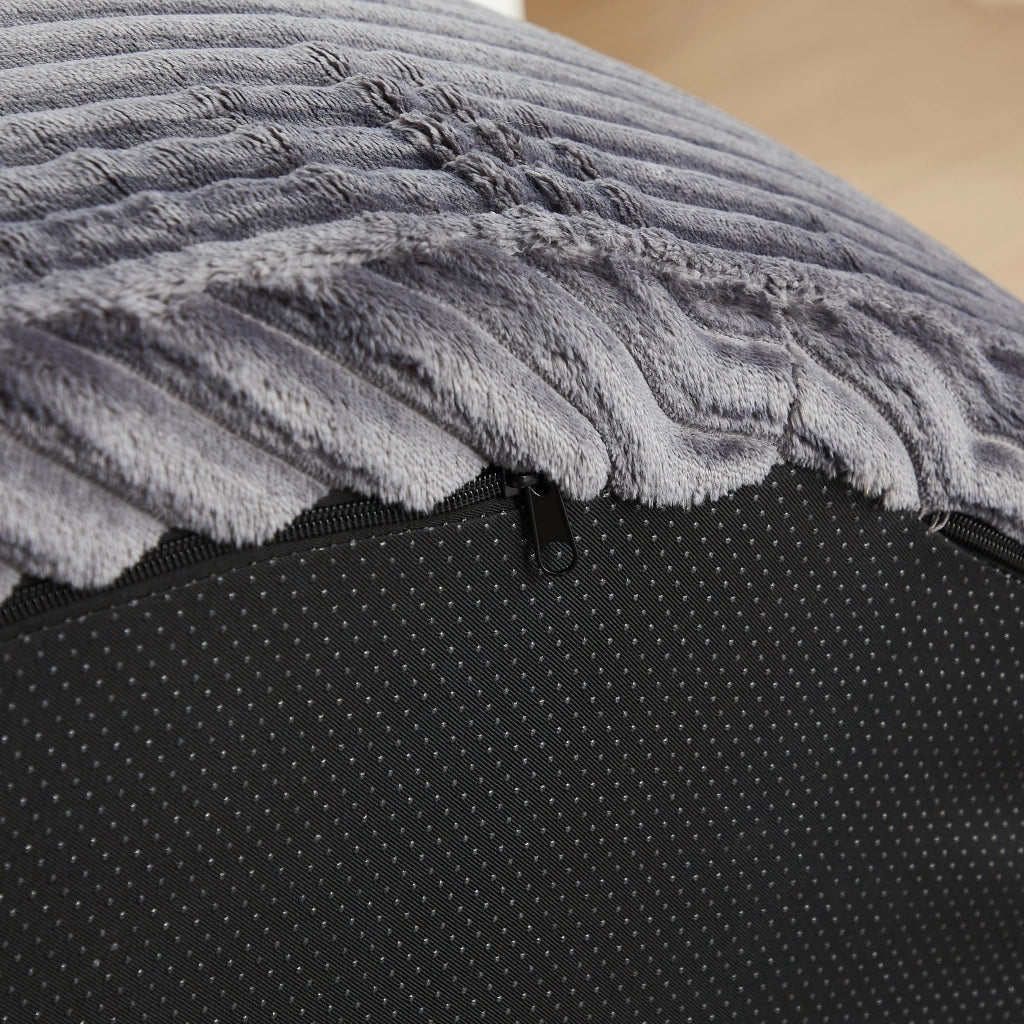 Poltrona lounge rotonda in velluto a coste grigio con tre cuscini e braccioli ampi diametro 110 cm