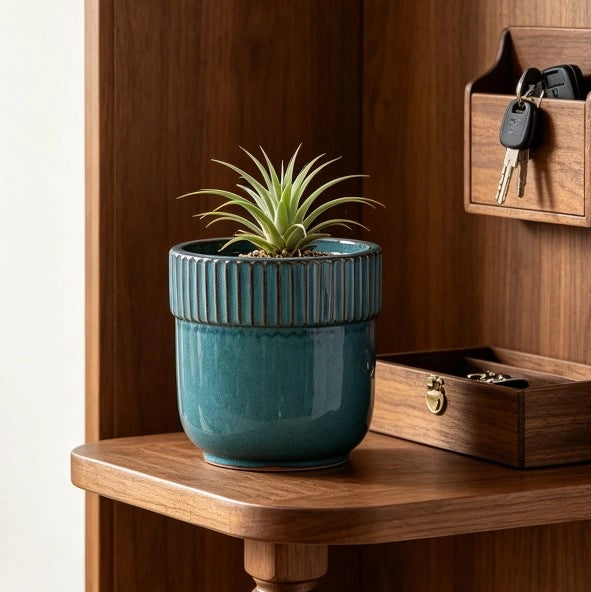 Fioriera a più livelli in ceramica artigianale smaltata turchese lucido con scanalature verticali Ø 23 cm