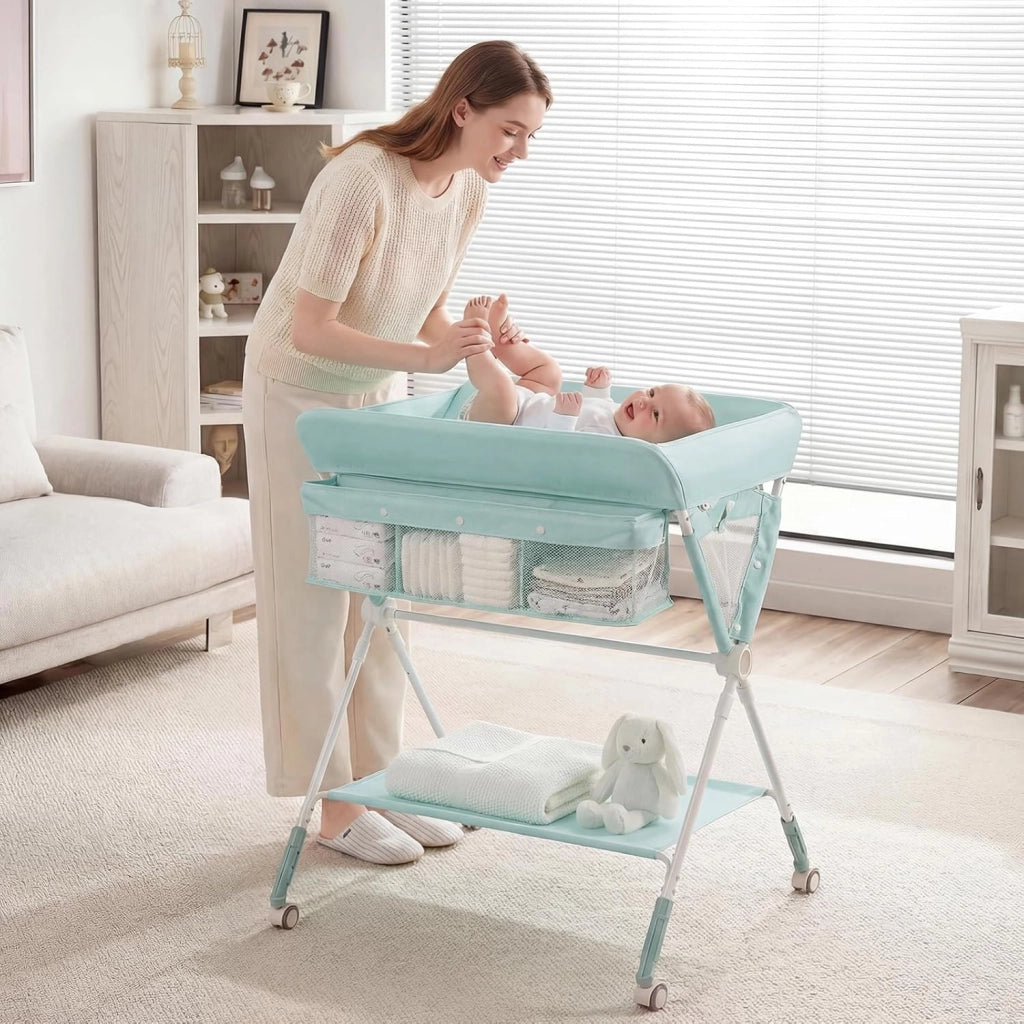 Fasciatoio Pieghevole per Bambini, Fasciatoio Portatile con Altezza Regolabile a 3 Livelli, Fasciatoio Neonato con Ruote di Bloccabili, Ripiano, Porta Asciugamani, per 0-12 Mesi (Verde)