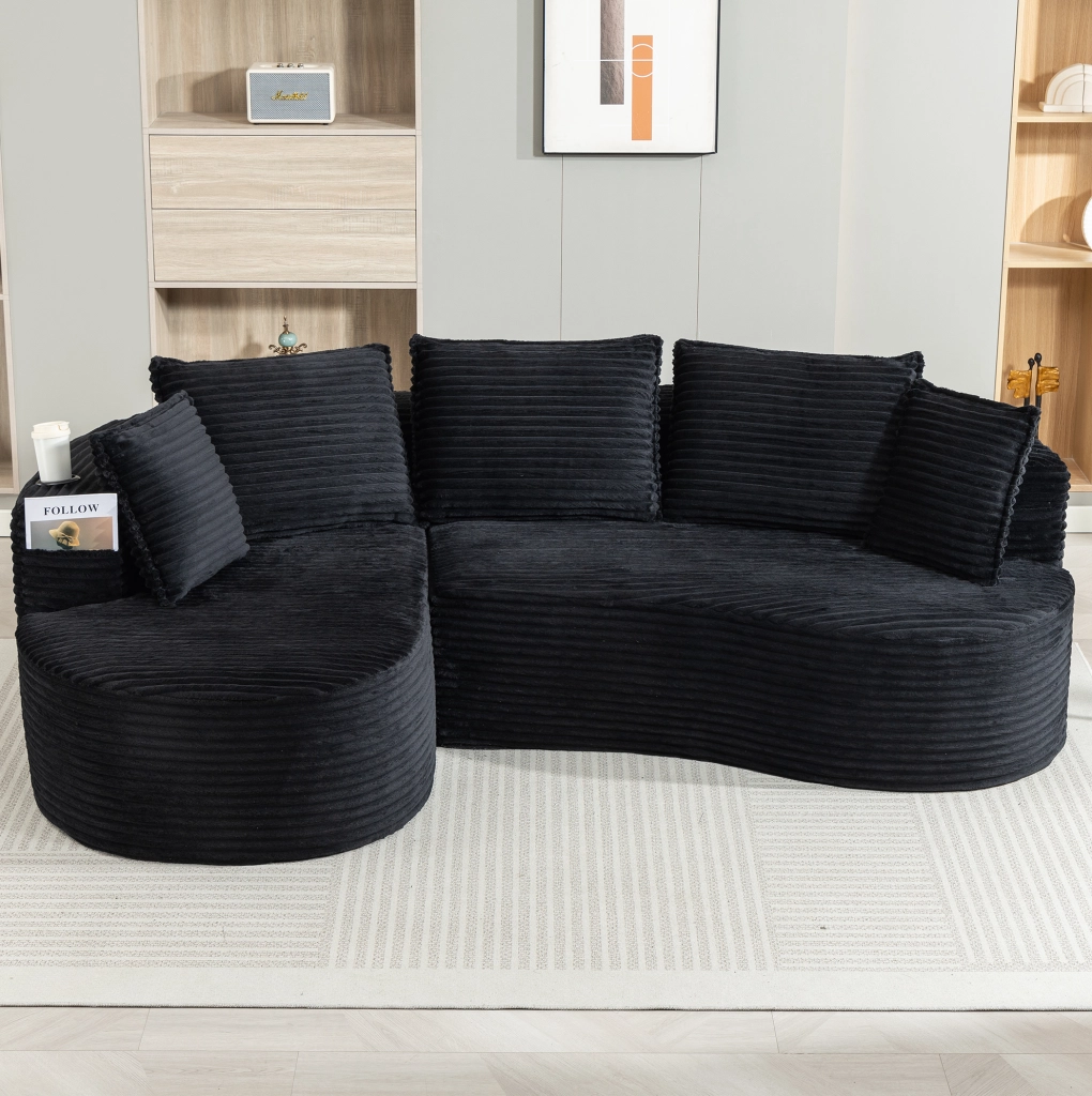 Divano ad arco in velluto a coste nero con portabevande e tasche laterali; 250×152×82 cm