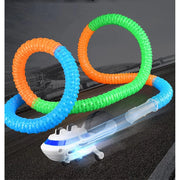 Trade Shop - Set 243 Pezzi Pista Luminosa Led Ad Anello A 360° Carri A Binario Auto Q-wj668 -