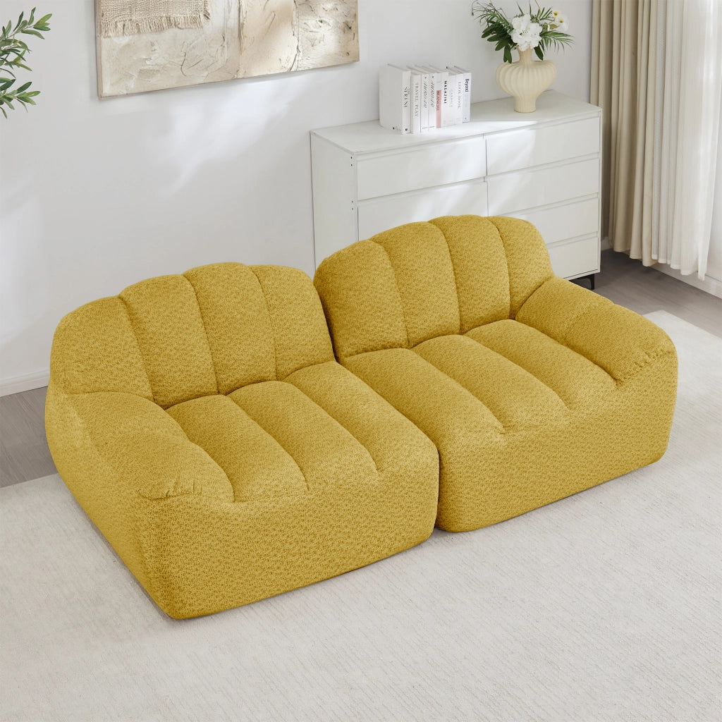 Divano modulare senza struttura con seduta ergonomica e cuscini profondi per soggiorno in pile granulato giallo