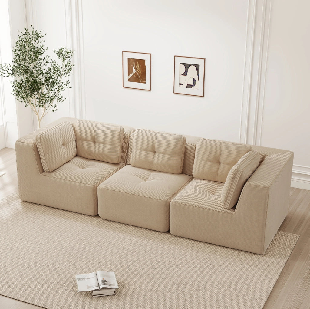 Divano angolare modulare beige in velluto a coste; seduta profonda