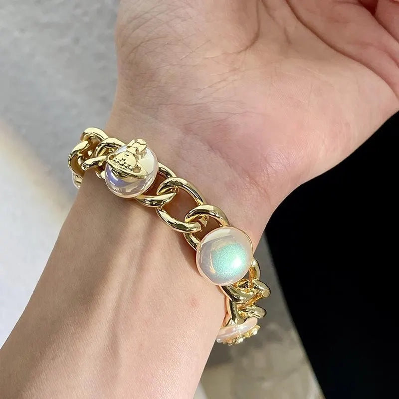 Set di collana, bracciale e orecchini di perle fatti a mano: gioielli con perline.