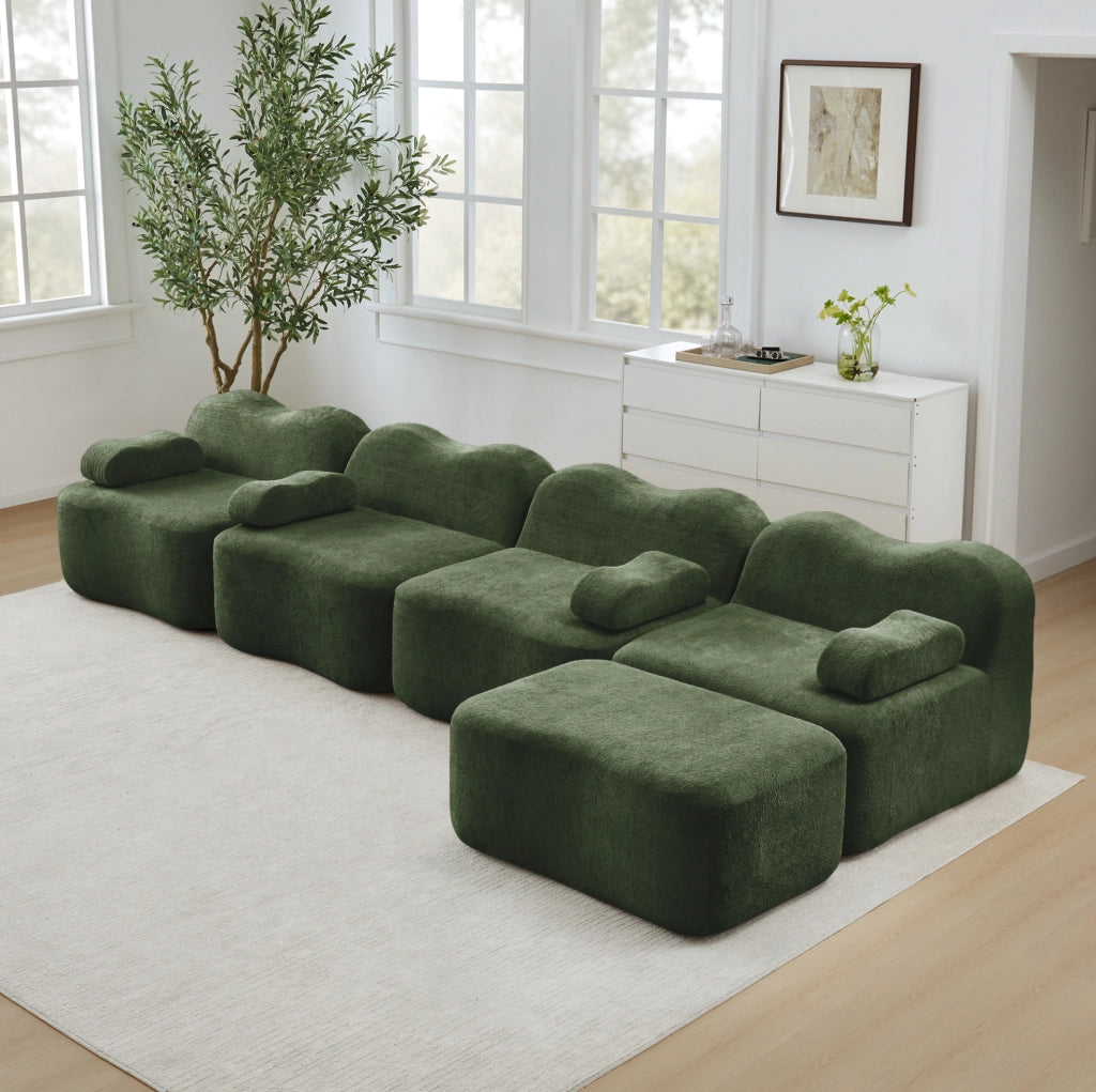 Divano angolare modulare senza struttura con pouf collegabile; velluto verde