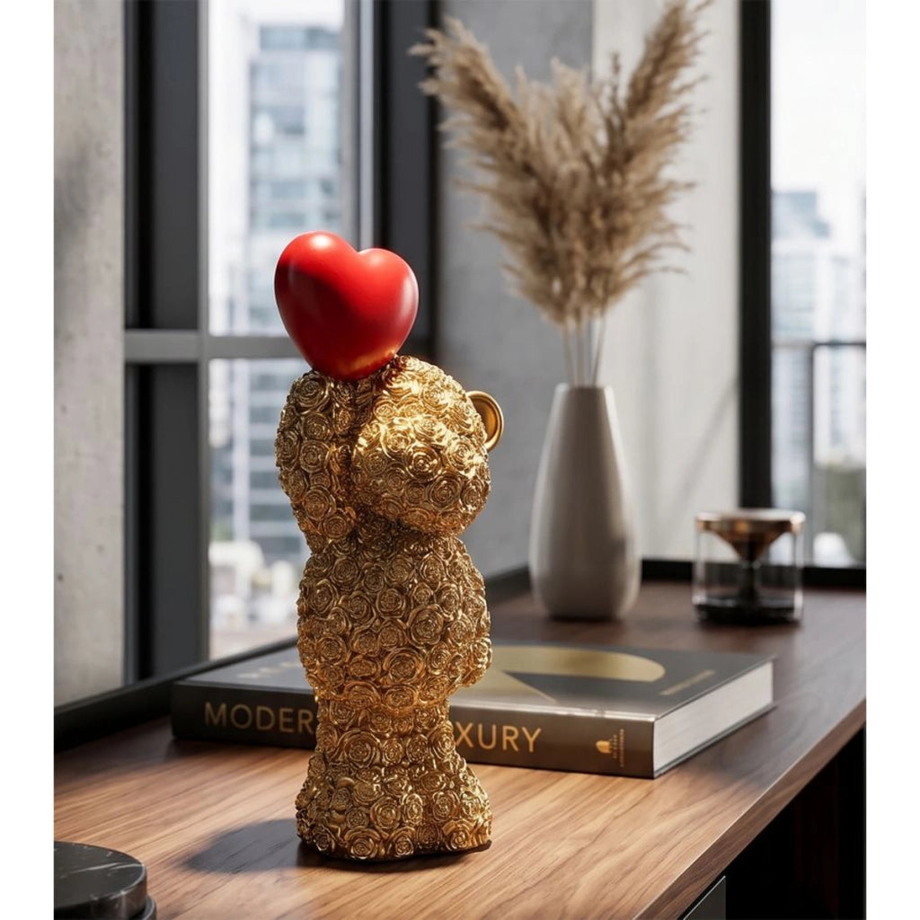 Scultura decorativa Orsetto con cuore in poliresina oro