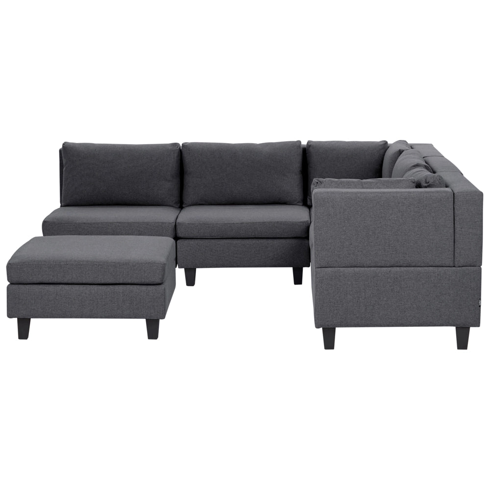 Divano componibile a 5 posti imbottito lato sinistro in tessuto grigio scuro con gambe nere e pouf stile moderno
