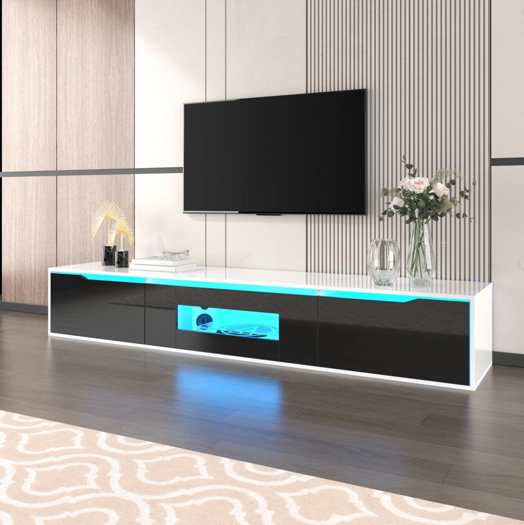 Mobile TV bianco e nero con frontale scanalato; LED a 16 colori; 180 × 35 × 30 cm