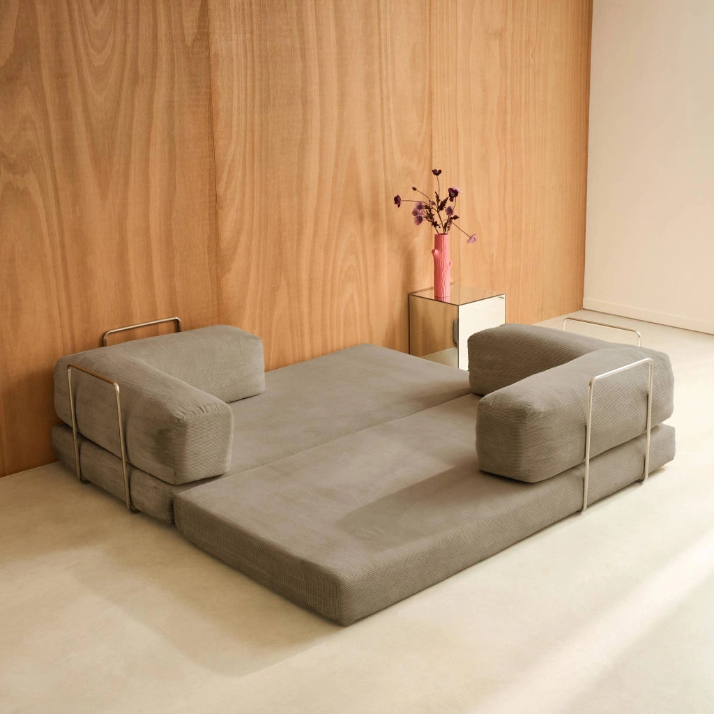 Divano letto futon in velluto a coste e struttura cromata, talpa