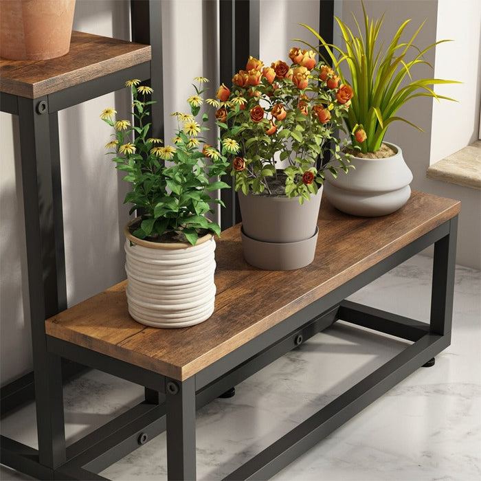 Supporto per piante con misure 51x34x67 cm, colore marrone, ideale per la casa o il balcone.