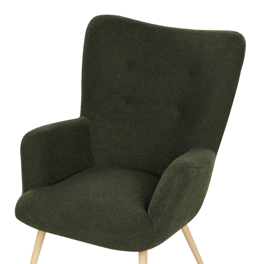 Poltrona rivestita in tessuto verde scuro con motivo floreale con poggiapiedi in stile retrò