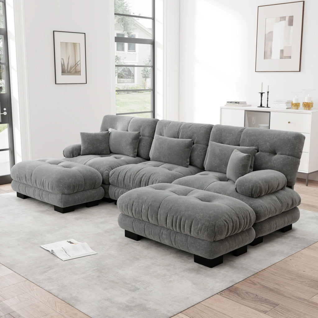 Divano modulare a U con ottomane mobili in chenille grigio; seduta profonda