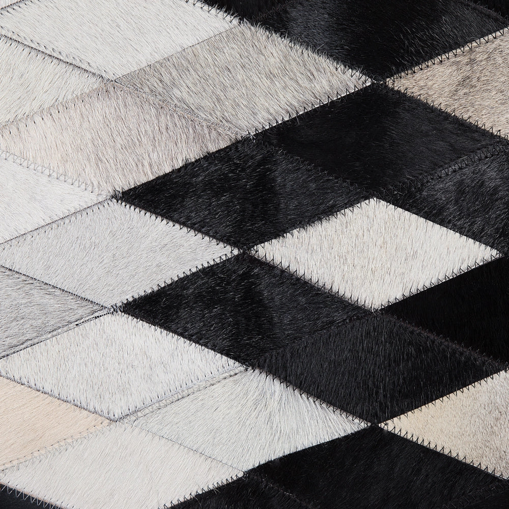 Tappeto Bianco e Nero in Pelle 140 x 200 cm Moderno Patchwork Fatto a Mano