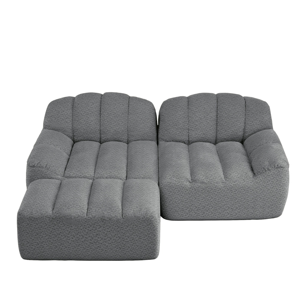 Divano angolare modulare senza struttura con pouf e seduta ampia in pile granulato grigio 210 × 165 × 79 cm