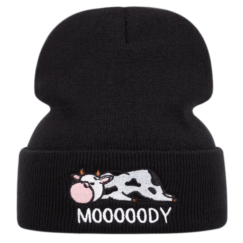Cappelli neri con ricamo a forma di mucca