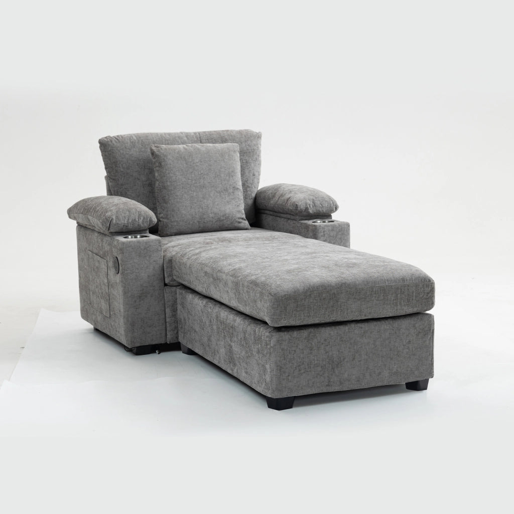 Poltrona reclinabile in chenille grigia con portabicchieri e vani laterali, con cuscino schienale e cuscino decorativo