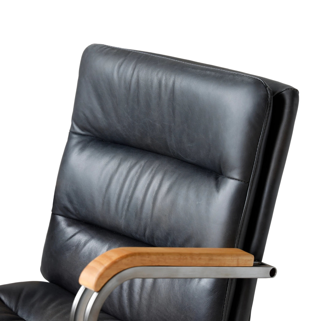 Sedia da ufficio girevole ergonomica regolabile in altezza; pelle e metallo; nera