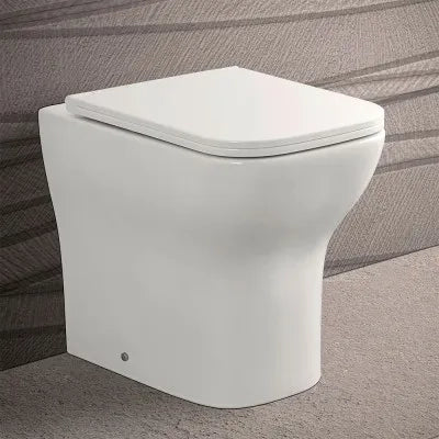 Wc filomuro bianco lucido senza brida con scarico multiplo  Plana