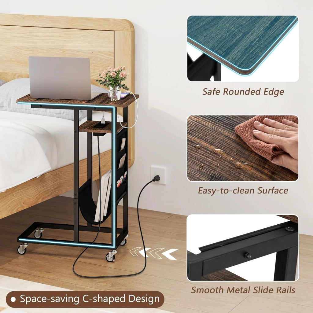Tavolino Laterale a C con Ruote e Stazione di Ricarica, Tavolino Compatto con 2 Prese AC e 2 Porte USB, Piano Retrattile, Tasca Laterale, Ruote Universali Bloccabili (Marrone)