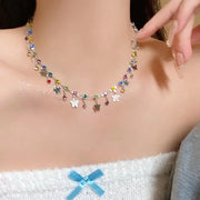 Collana a farfalla e stella realizzata a mano con perline: ciondolo con zirconi colorati