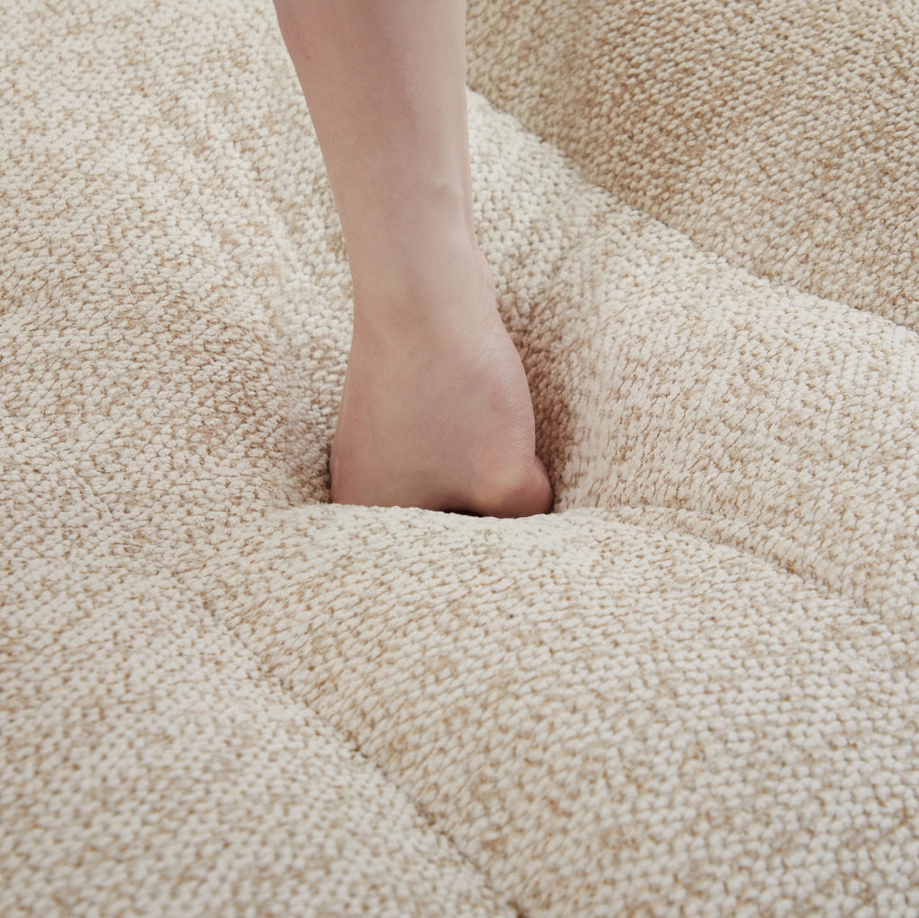 Divano modulare 4 posti con ottomana 366x165x79 cm in fleece granulato beige bianco