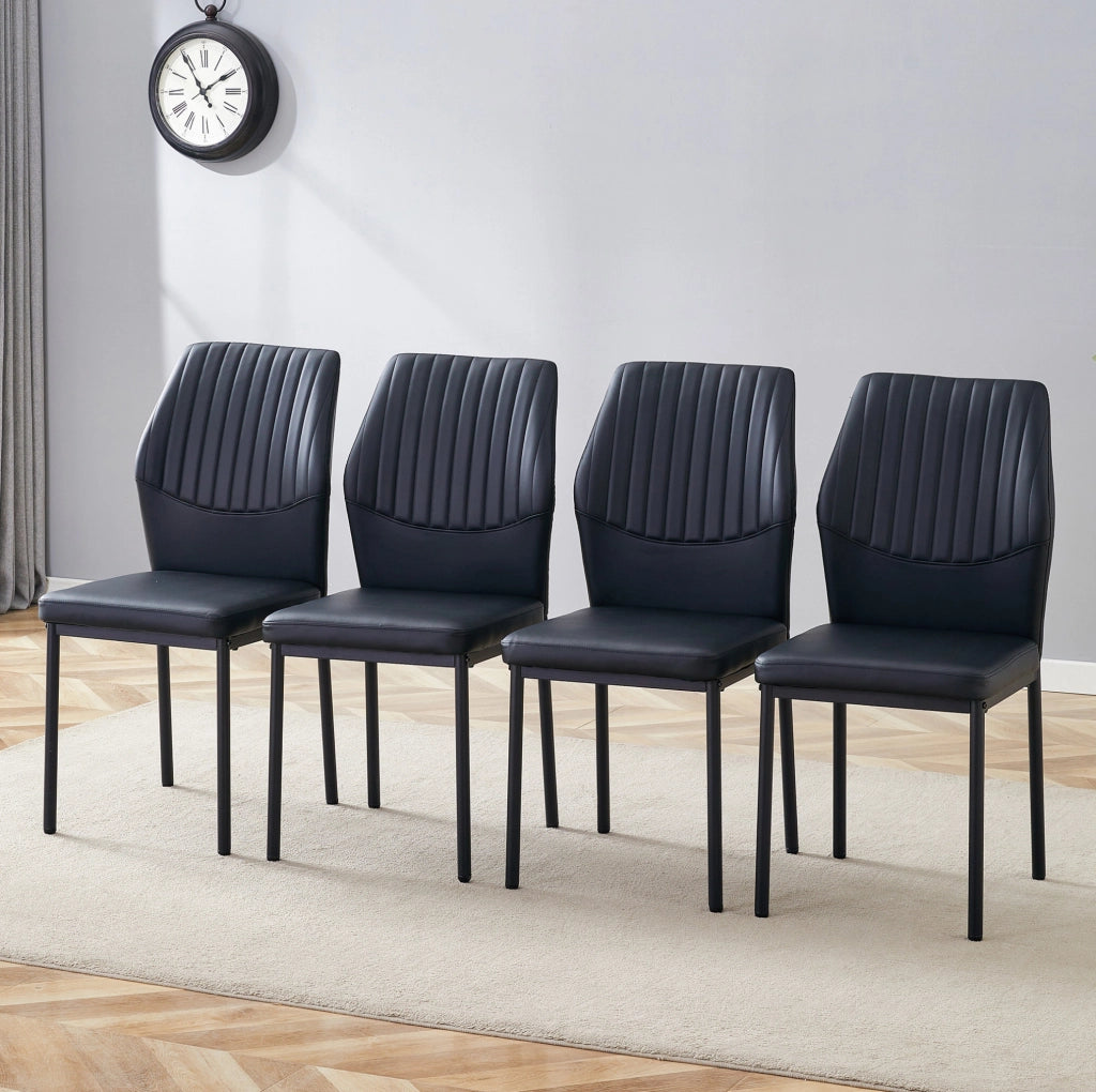 Set di 4 sedie da pranzo nere in PU con schienale a coste e gambe in metallo; h 93 cm