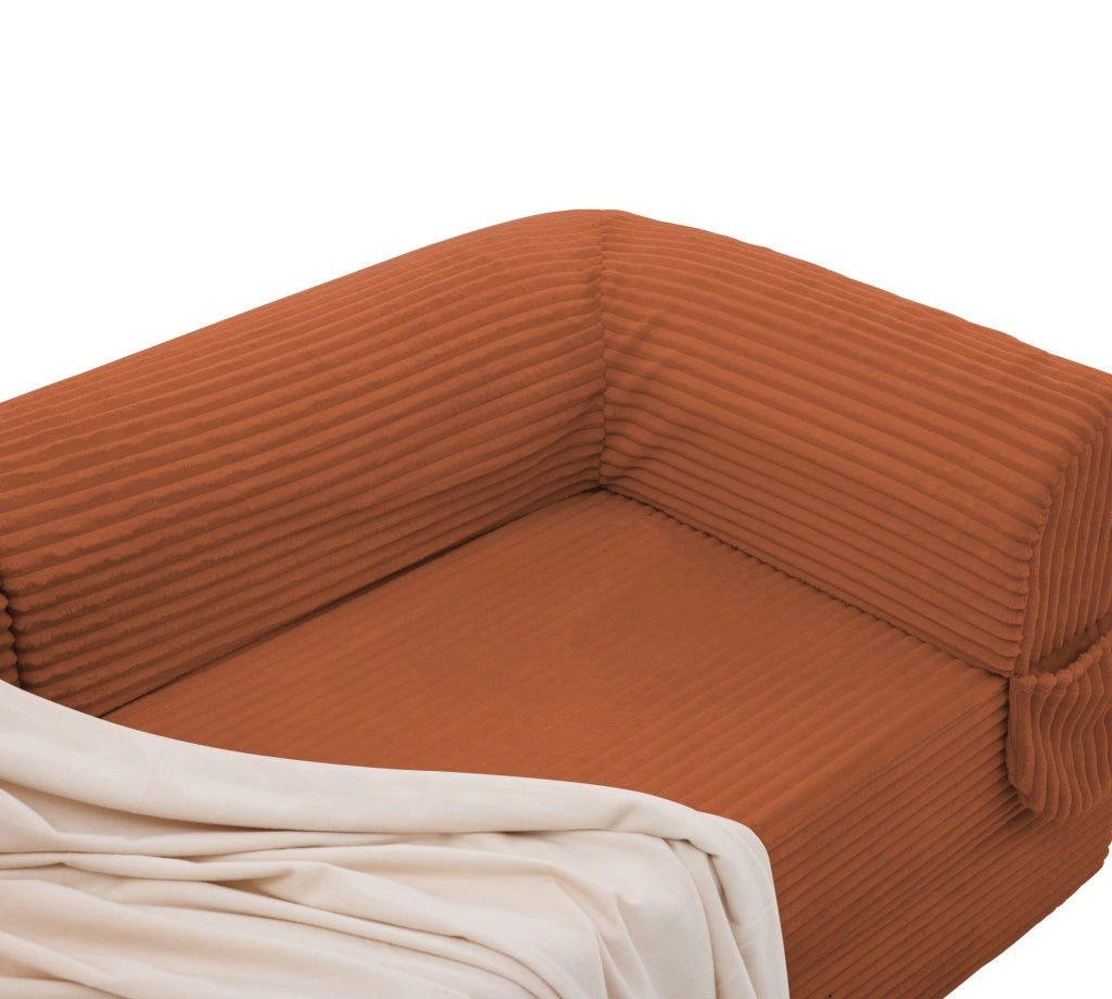 Divano letto due posti convertibile arancione imbottito in tessuto a coste per ambienti compatti