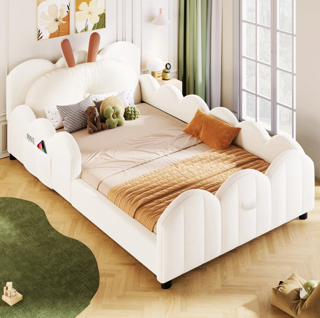 Letto a piattaforma imbottito 90x200 cm beige con testiera a forma di coniglietto e sponde protettive