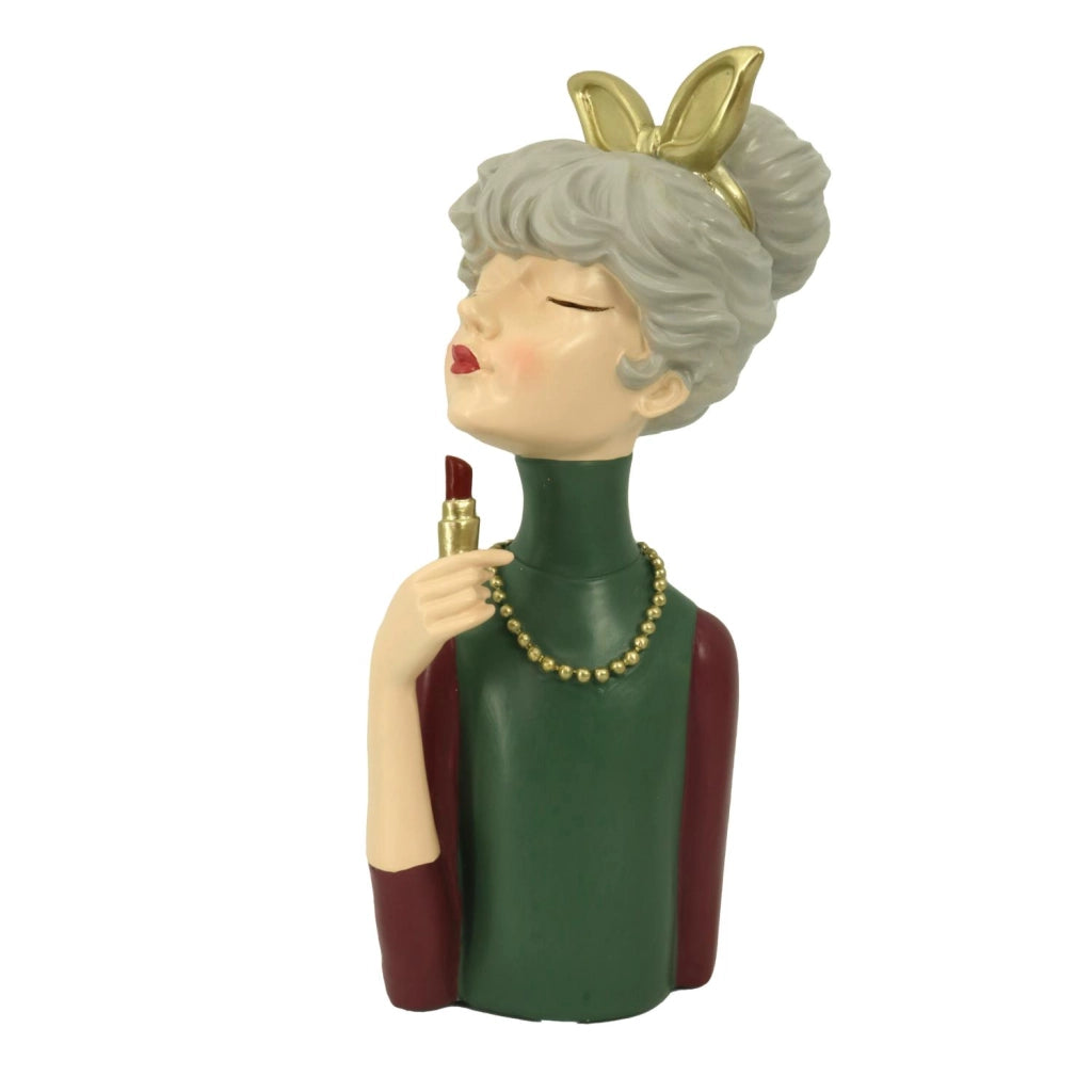 Donna resina con rossetto verde cm16,5x12h32