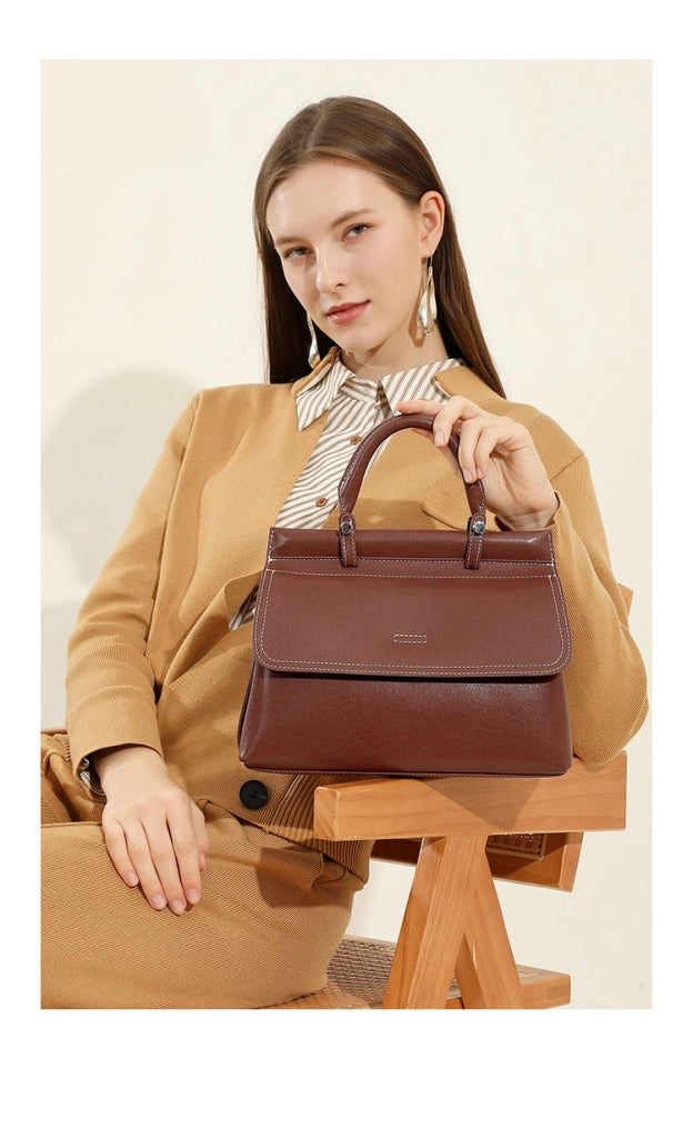 Borsa a mano da donna in vera pelle, colore marrone.