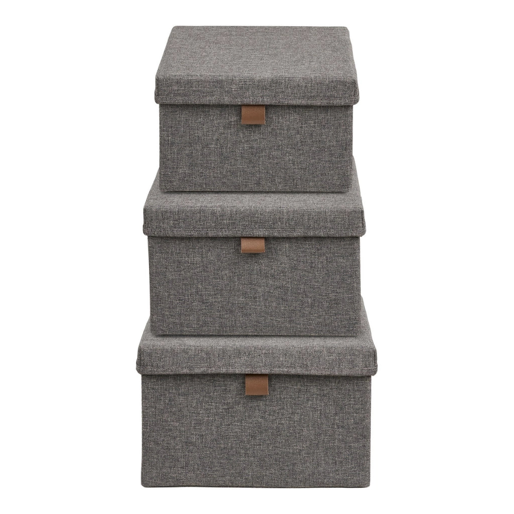 Set 3 scatole Noto in tessuto grigio scuro con coperchio e linguetta in ecopelle