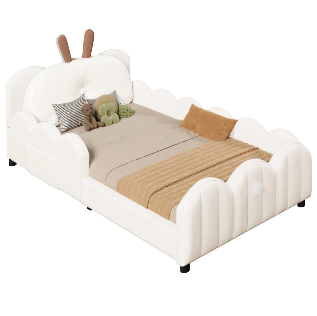 Letto a piattaforma imbottito 90x200 cm beige con testiera a forma di coniglietto e sponde protettive
