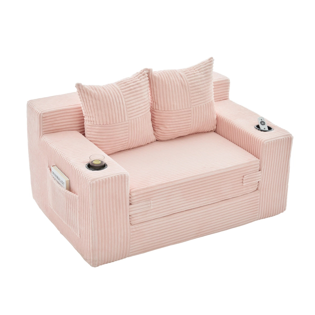 Divano pouf in velluto a coste rosa con due cuscini tasche laterali e braccioli