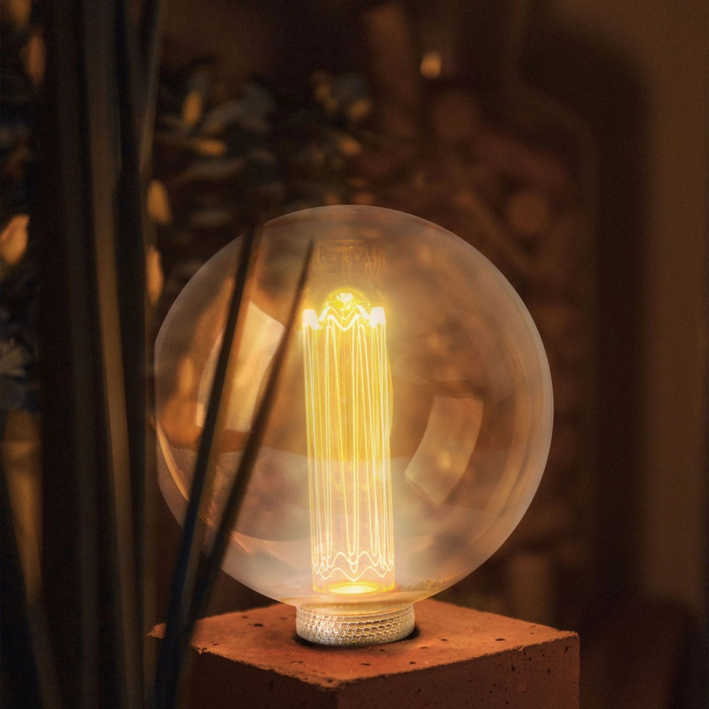 Lampadina LED decorativa G125 ambra E27 4W 1800K Polux