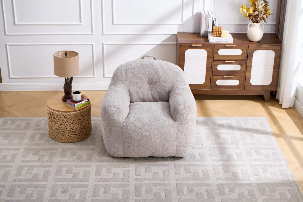 Pouf in pelliccia sintetica con braccioli e imbottitura in schiuma sminuzzata, senza montaggio, grigio chiaro