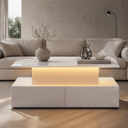 Tavolino da caffè LED in finitura bianco lucido 90x55x41 cm con 4 cassetti e vano contenitore