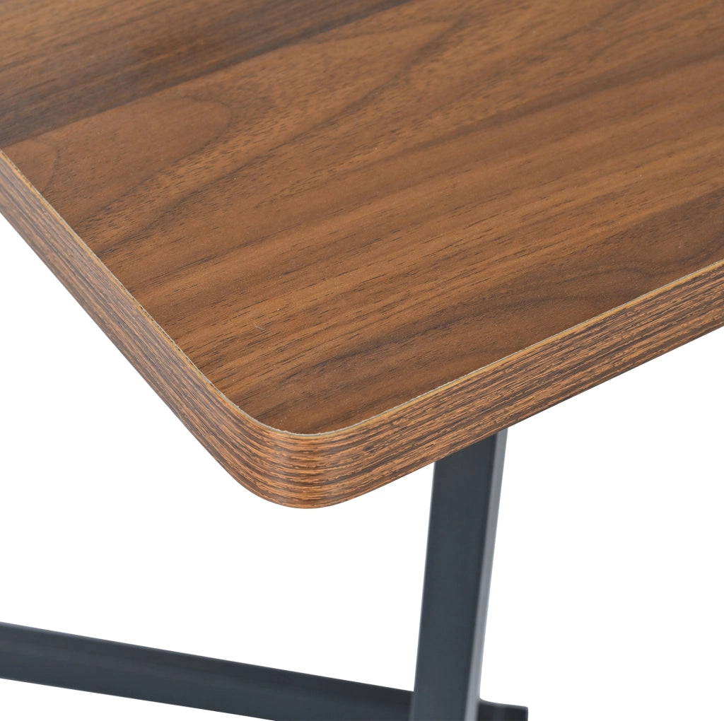Tavolo da pranzo 117x68x75 cm in MDF con gambe in metallo; nero e noce