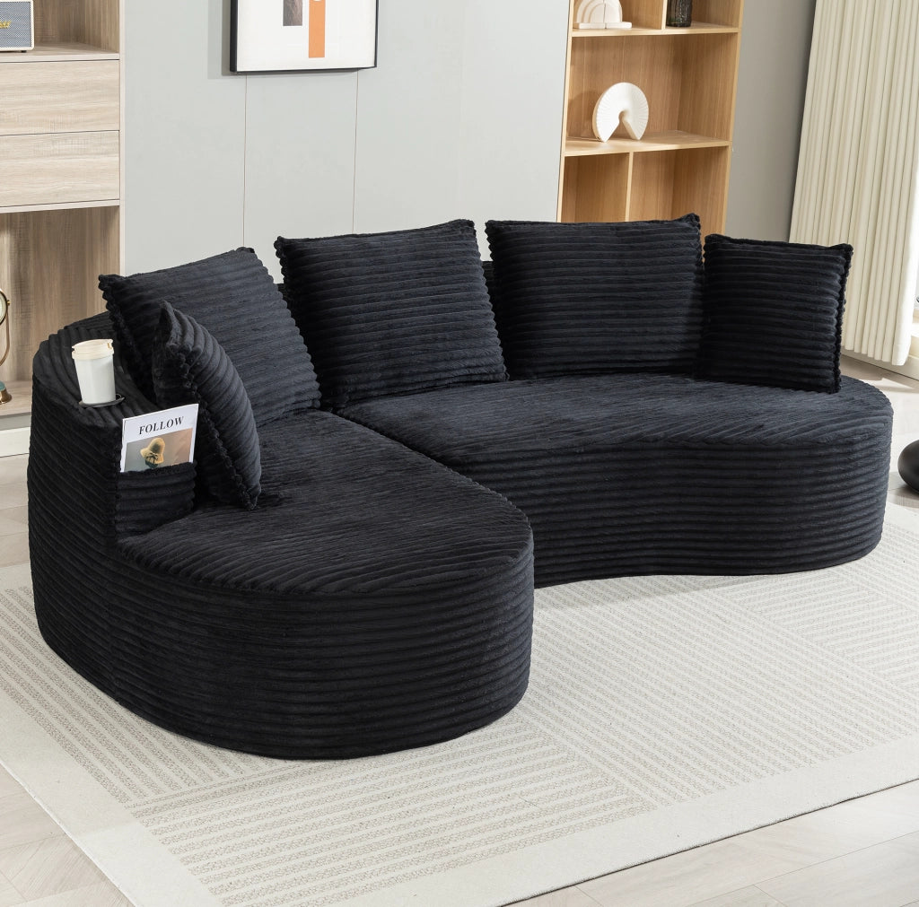 Divano ad arco in velluto a coste nero con portabevande e tasche laterali; 250×152×82 cm