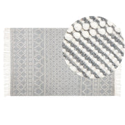 Tappeto in lana beige grigio a mano con motivo geometrico e nappe 160 x 230 cm soggiorno camera da letto