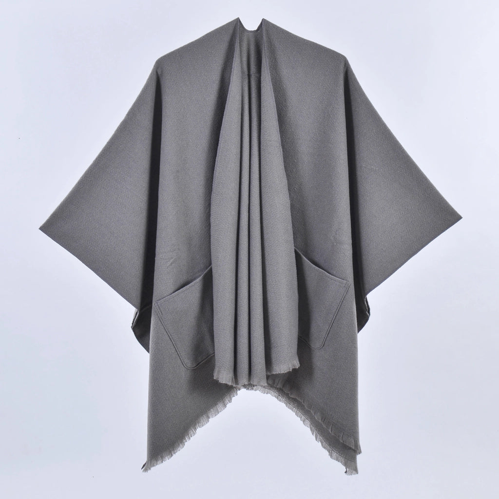 Nuovo scialle monocromatico con tasche per donna, versatile mantello con spacco e nappe